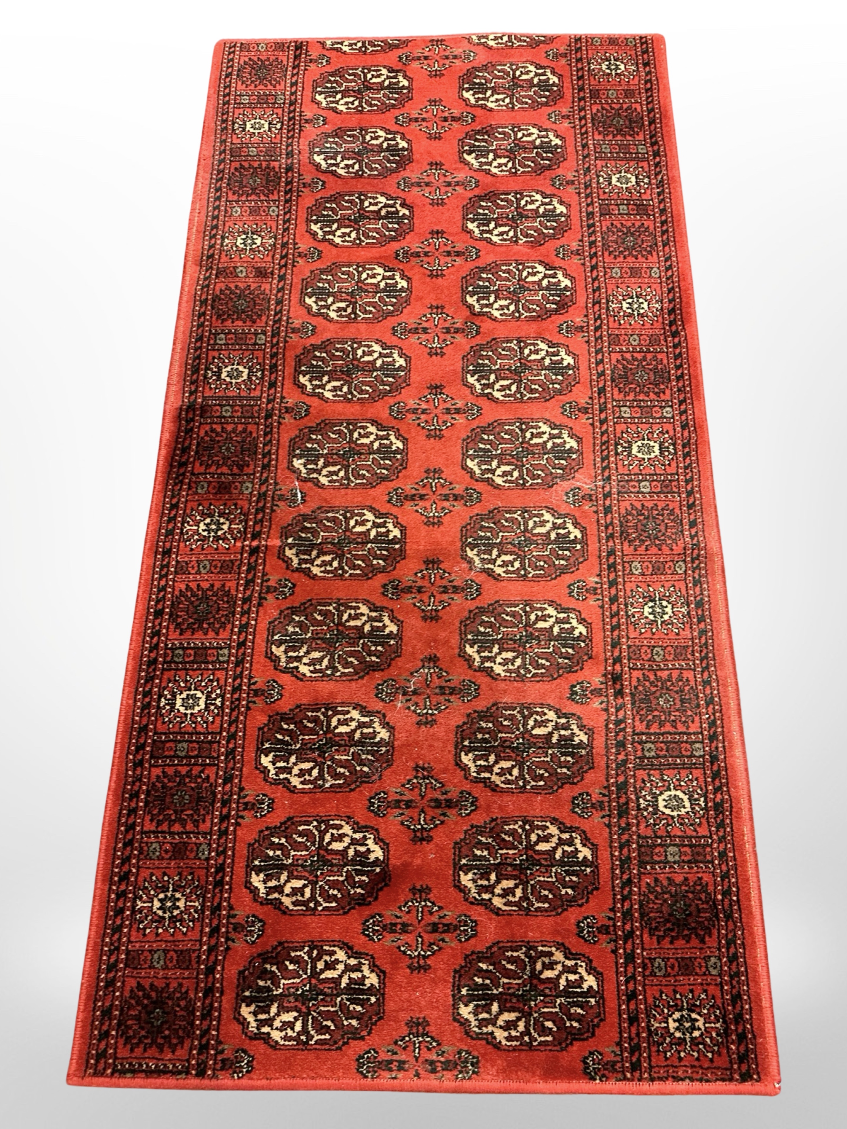 A machine made Afghan design runner,