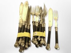 A set of EPNS fish cutlery with ebony handles