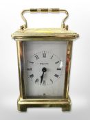 A French Bayard eight day brass carriage time piece,