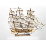A model of a three masted sailing ship,