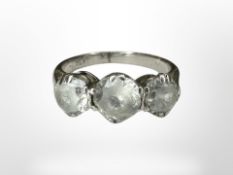 A platinum three-stone dress ring, size J/K CONDITION REPORT: 4.