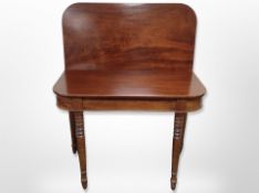 A 19th century mahogany turn over top tea table,