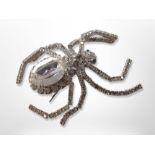 An encrusted spider costume brooch