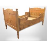 A late 19th century pine bed frame,
