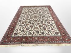 A machine-made carpet of Isfahan design,
