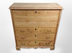 An early 20th century pine secretaire chest,
