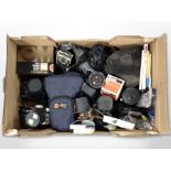 A box of vintage and later cameras, lenses,
