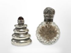 A miniature silver scent bottle with cabochon finial, plus anther crystal example with silver lid,