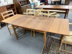 A 20th century Danish teak pull out extending dining table,