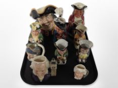 A Royal Doulton character jug - Town Crier D6530 together with a group of toby and character jugs