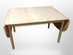 A 20th century Danish Getama Gedsted extending oblong coffee table,