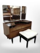 A G-Plan teak seven drawer tall boy and matching dressing table with stool