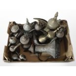 A box of Islamic brass and copper coffee pots
