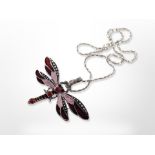 An enamelled dragon fly pendant on silver bead chain