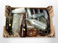 A box of antique glass bottles, some Newcastle,