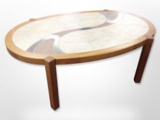 A Danish Haslev teak and tile inset oval coffee table,
