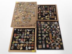 Several boards containing enamel collectable pin badges