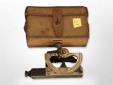 A WW I gun level in leather case