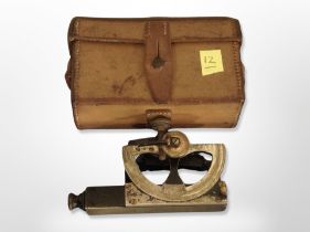 A WW I gun level in leather case