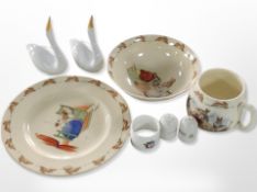 A Royal Doulton Bunnykins cup bowl and saucer, pair of Spanish porcelain swans,