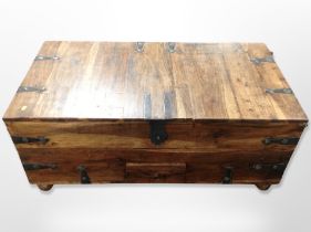 A wrought iron mounted mango wood storage chest,
