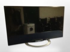A Sony Bravia 42 inch LCD TV with lead,