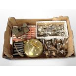 A box of brass kettle, assorted plated cutlery, set of six goblets,