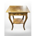 An oak two drawer occasional table,