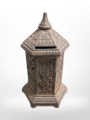 A cast iron money box, height 16.