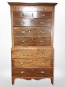 A George III mahogany and satinwood strung eight drawer chest on chest,