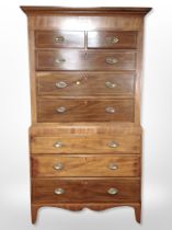 A George III mahogany and satinwood strung eight drawer chest on chest,