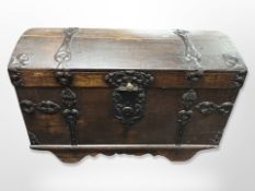 A 19th century oak iron bound dome topped trunk,