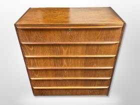 A 20th century Danish teak and pine six drawer chest,
