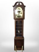 A reproduction Tempus Fugit longcase clock with pendulum and weights,
