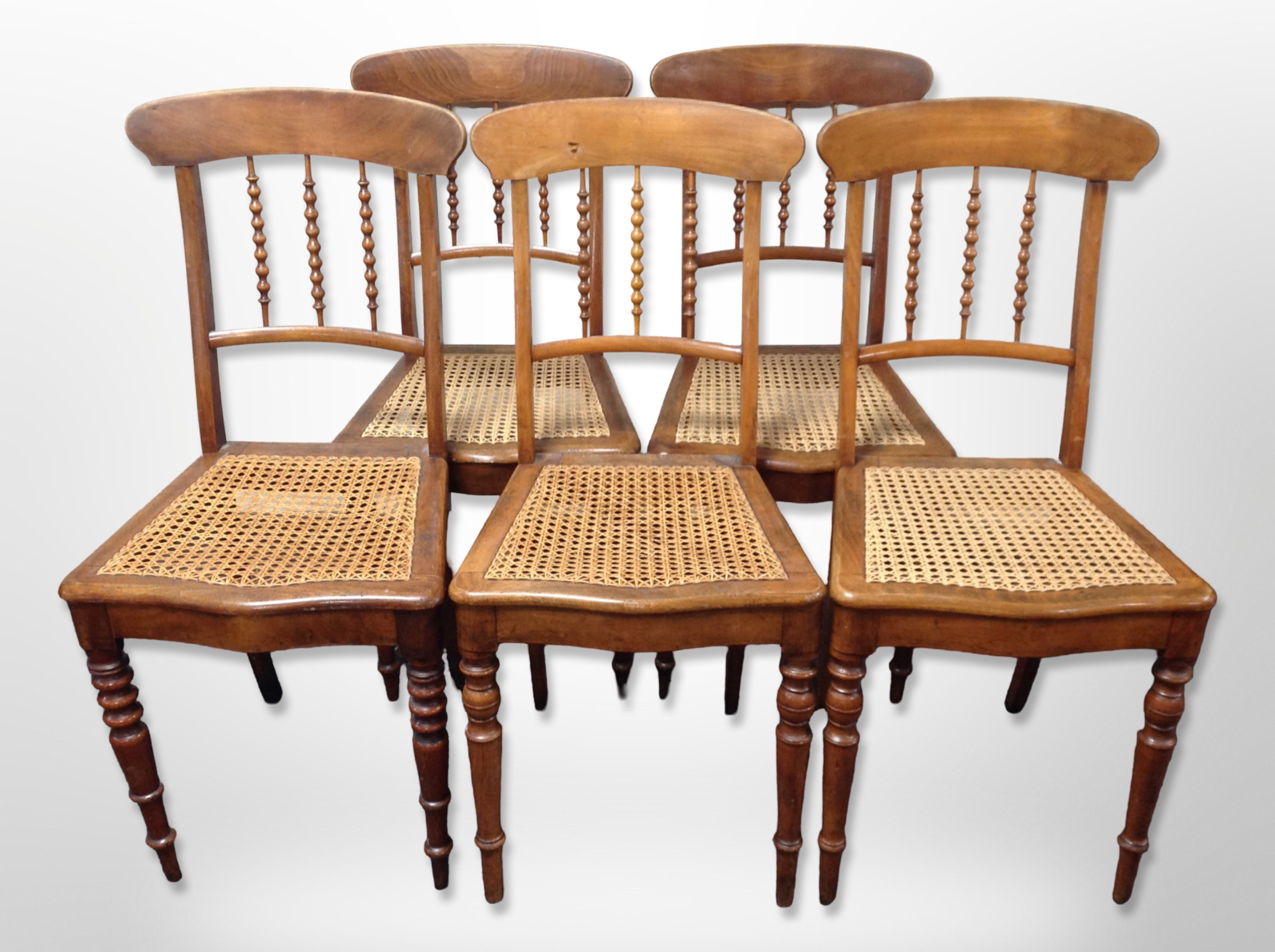 Six 19th century beech and bergere dining chairs