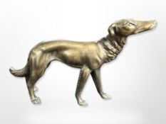 A brass figure of a dog,