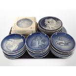 A collection of Bing & Grondhal and Royal Copenhagen blue and white plates