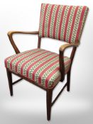 An early 20th century continental beech framed elbow chair