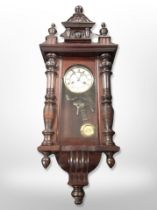 A 20th century mahogany Vienna wall clock with enamelled dial,