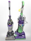 A Vax and Dyson upright vacuum cleaners