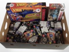 A box of Hasbro Transformers figures and a further X Men Transformers model,