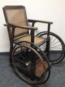 An antique Bencraft wheelchair by John Bentley & Co Ltd,
