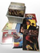 A box of vinyl LP's, Rod Stewart, Eagles, Prince, Queen, Elton John, ELO, Status Quo,
