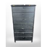 A 20th century Danish painted pine seven drawer cabinet,