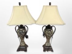 A pair of contemporary gilt table lamps with shades,