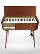 A vintage Royal Artist teak-cased piano accordion on tapered legs, Made in Italy, width 63cm.