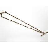 A 9ct gold watch chain with T-bar, length 39cm CONDITION REPORT: 10.