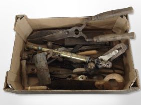 A collection of antique and vintage hand tools including Footprint woodworking plane,