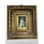 Contemporary school : A girl playing with a kitten, oil on panel, 16cm x 11cm, in ornate gilt frame.