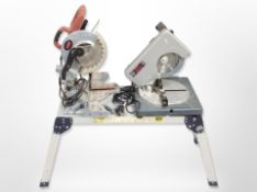 A folding Abru aluminium work bench, together with a Performance 205mm compound mitre saw,